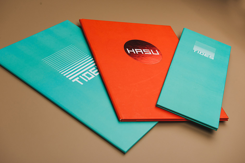 Tides and Hasu menu-holder, Sun Resorts, printed by Précigraph
